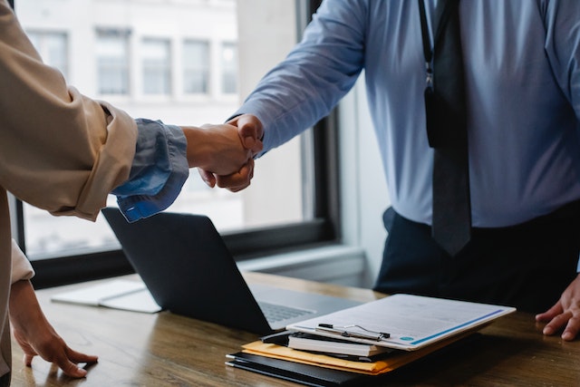 business people shaking hands